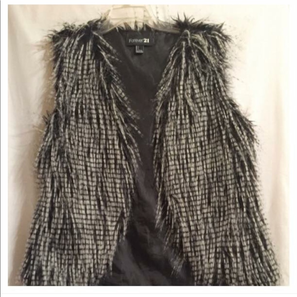 Black and white fur faux vest from forever 21.